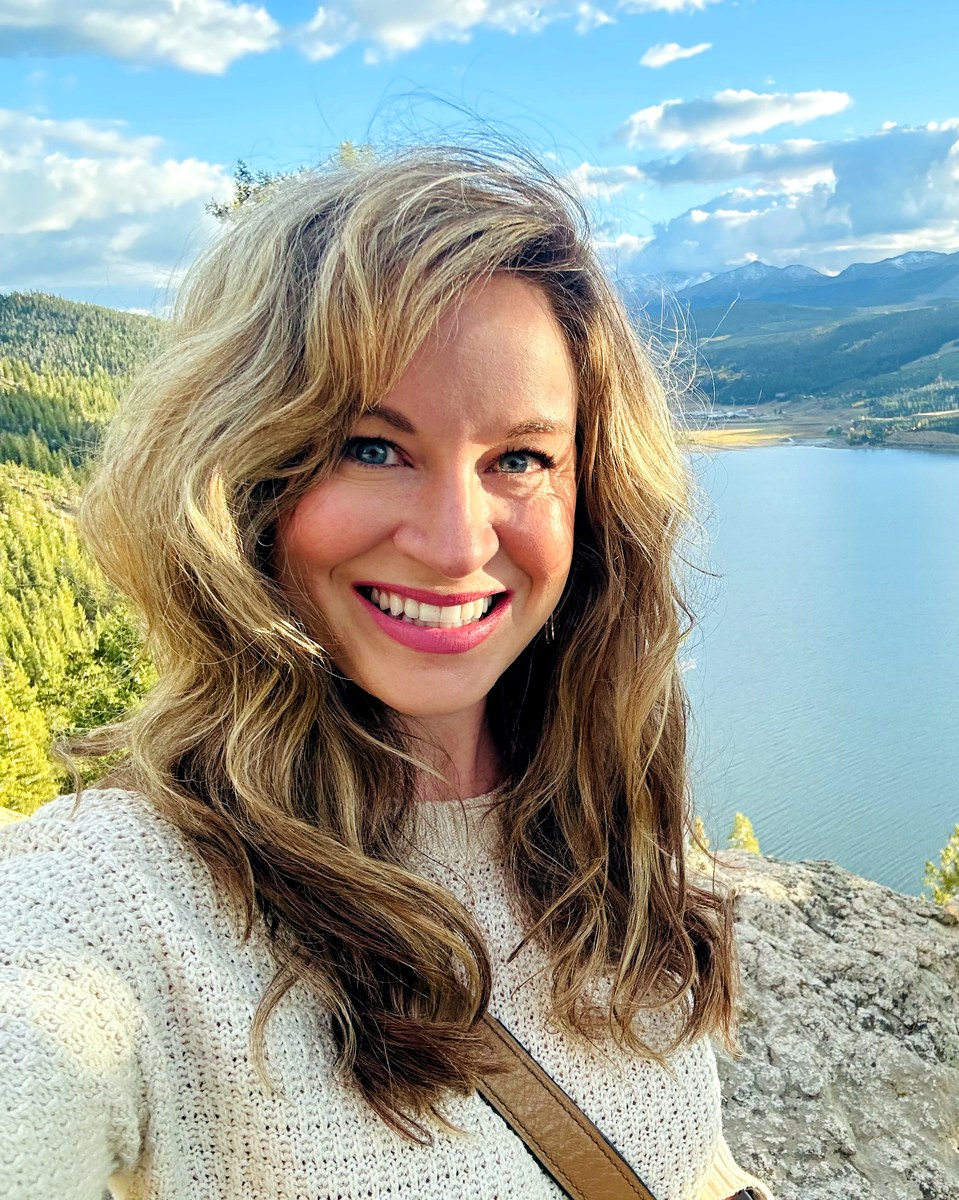 Nancy Fry above a mountain lake in Colorado